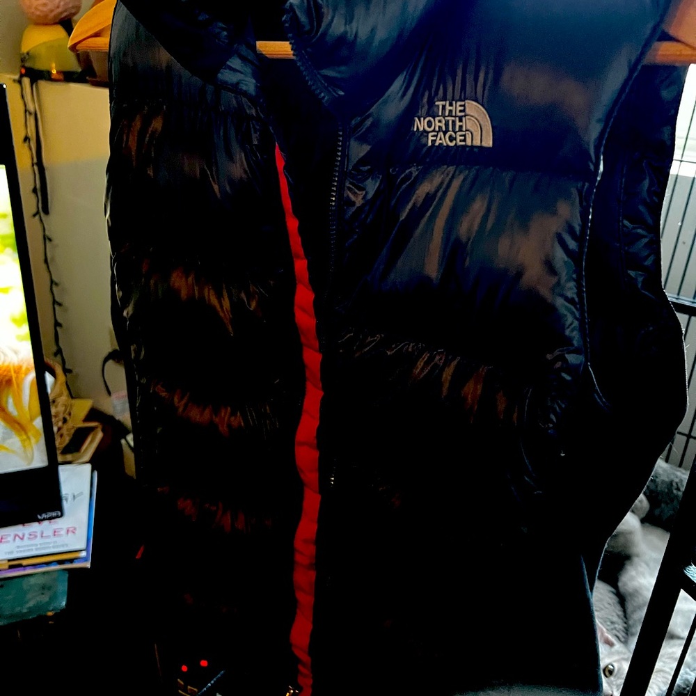 Athletic cut medium women’s Summit Series North Face down vest.